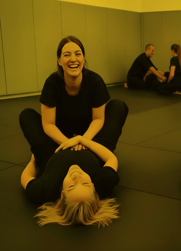 Women learning ground-fighting